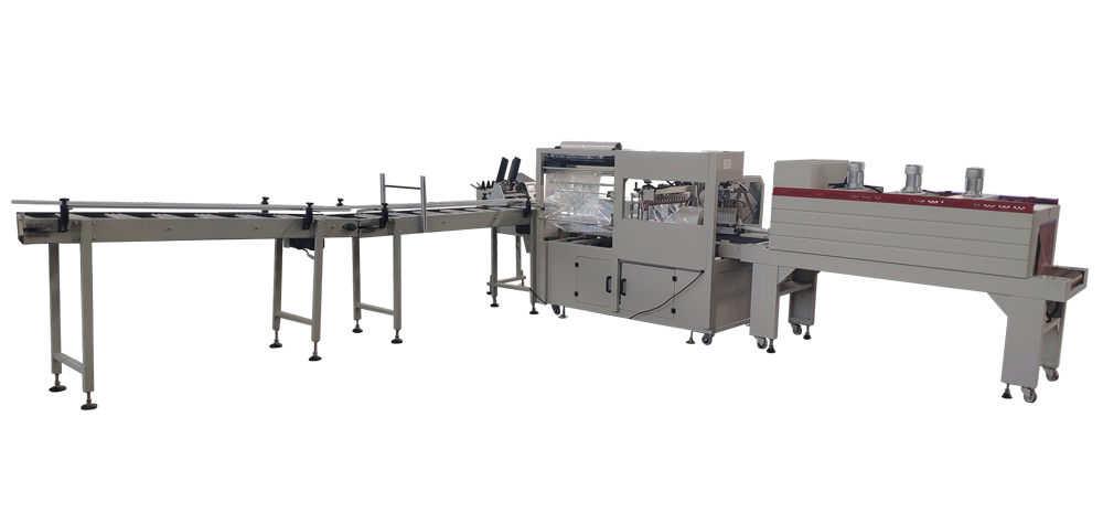 Automatic labeling maxi roll shrink packing machine.jpg