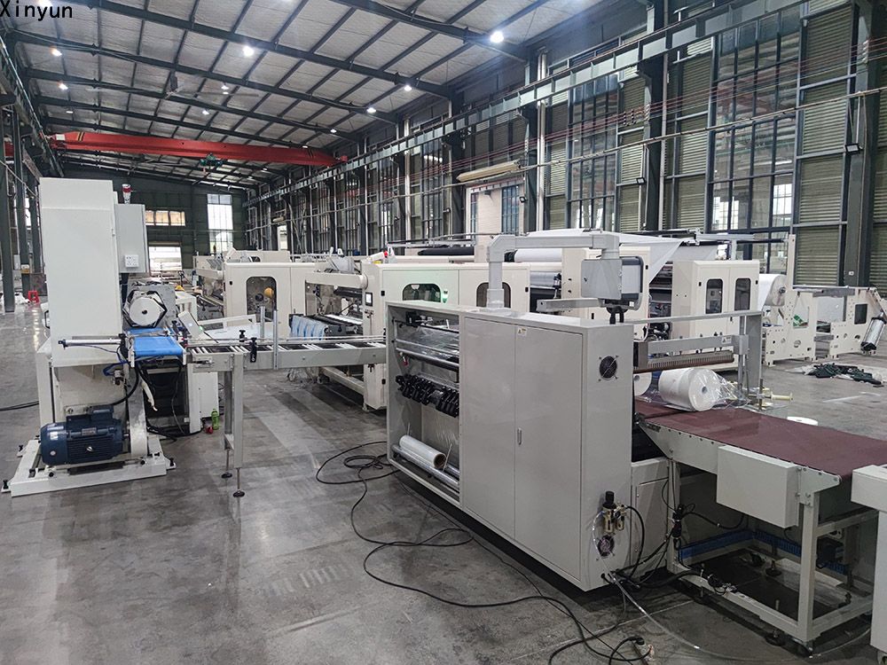 Automatic labeling maxi roll gluing lamintation production line