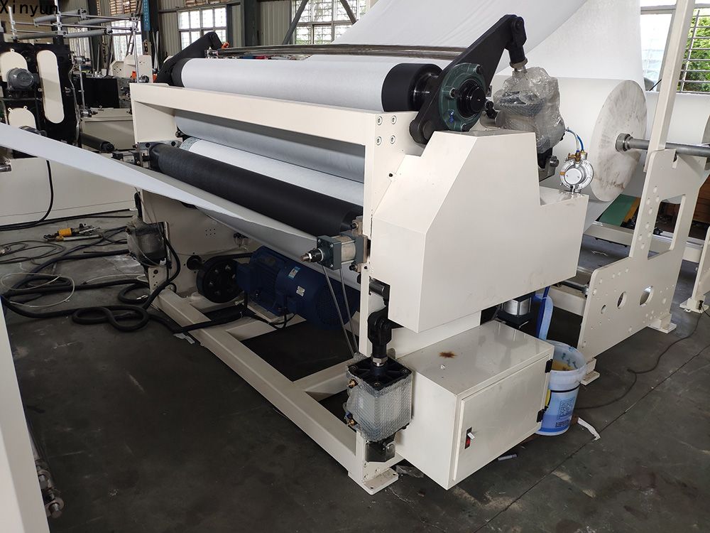 Automatic toilet paper and kitchen towel paper making machine