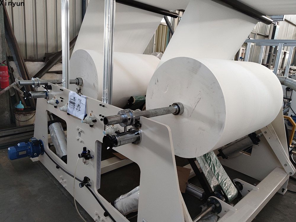 Automatic embossing folding facial tissue paper making machine