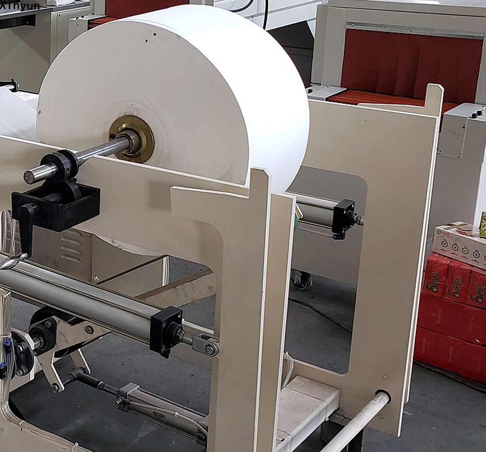 Automatic embossing folding color printing napkin tissue paper making machine